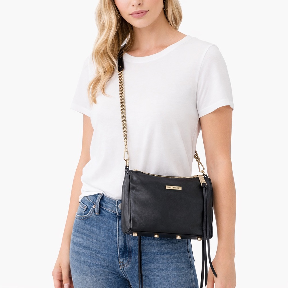 Rebecca Minkoff 3 zipper black crossbody/clutch with the tassels removable strap